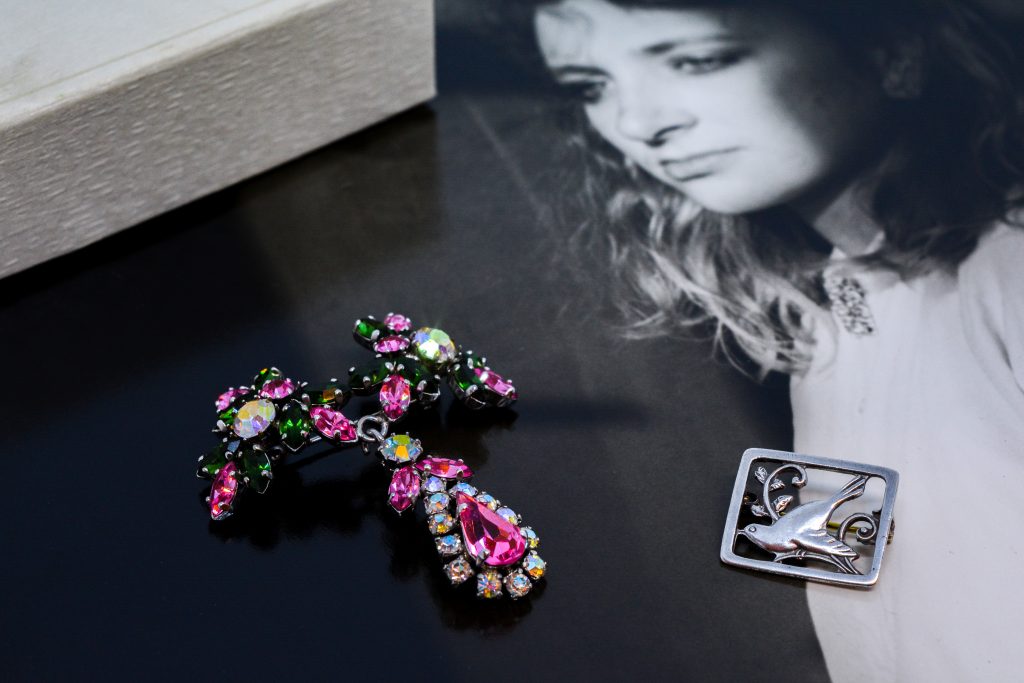 A danish silver bird brooch and vintage costume jewellery brooch by Norman Hartnell.