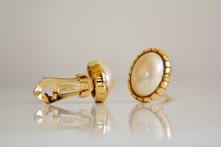 A pair of clip on Christian Dior earrings. Perfect bridal accesory