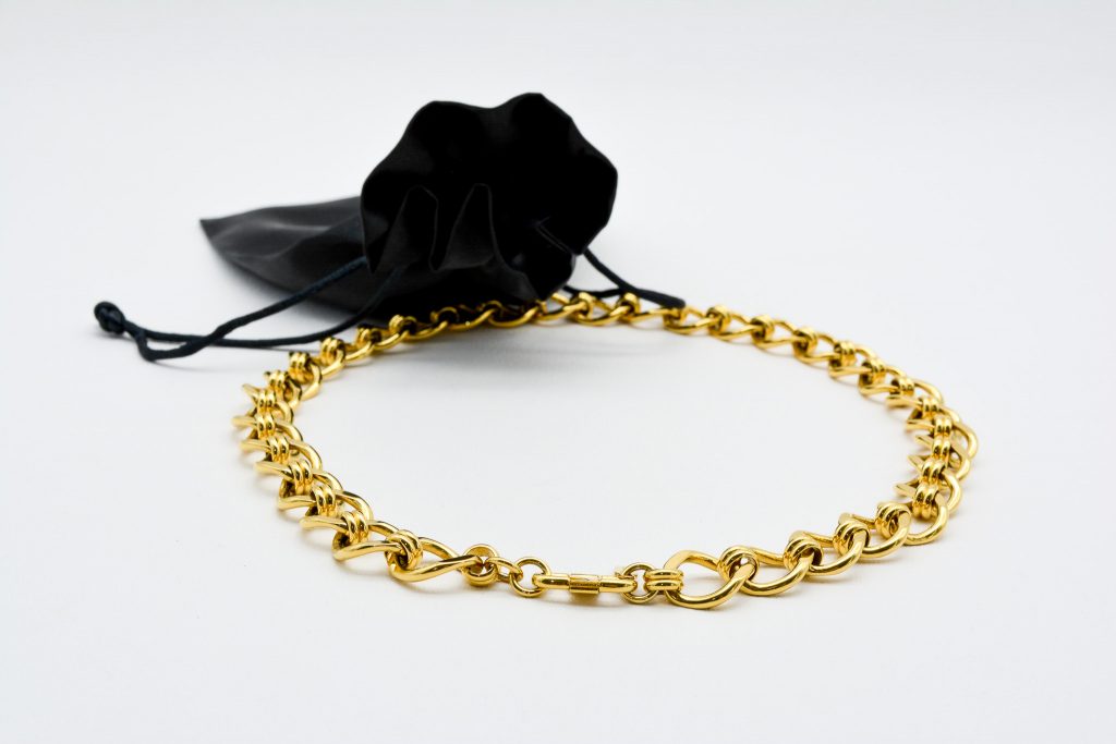 Gold coloured necklace with chain links