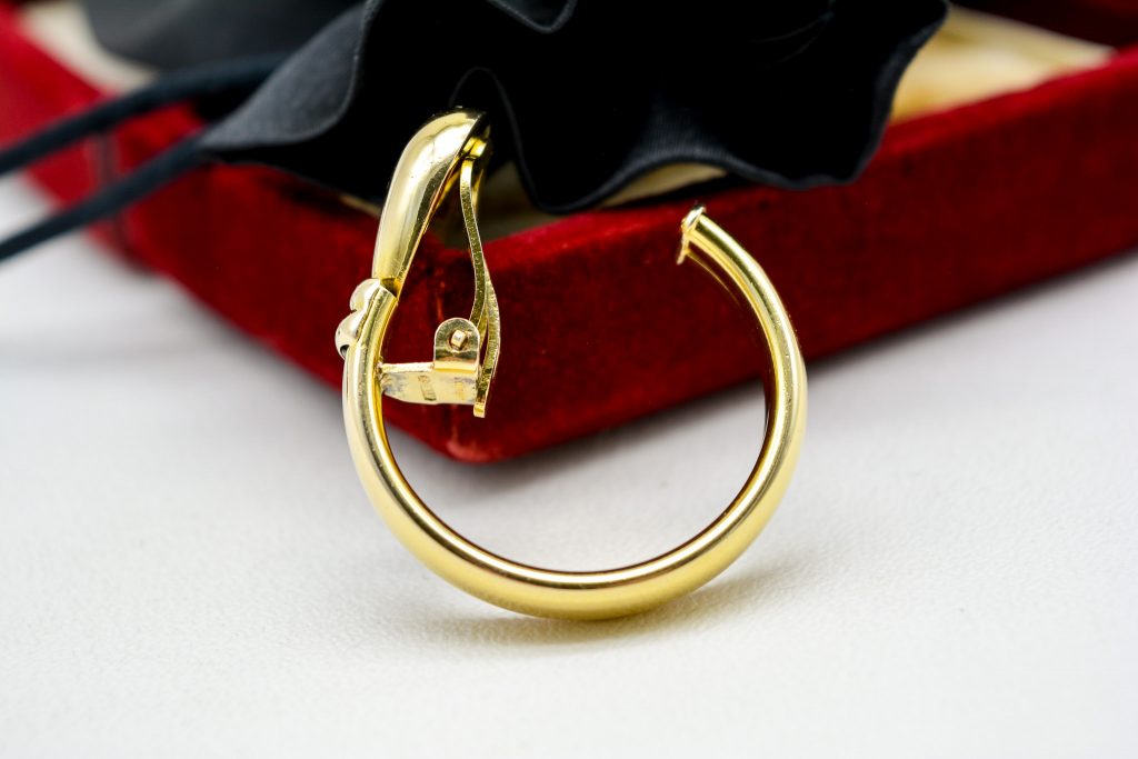 Large clip on silver gilt earring